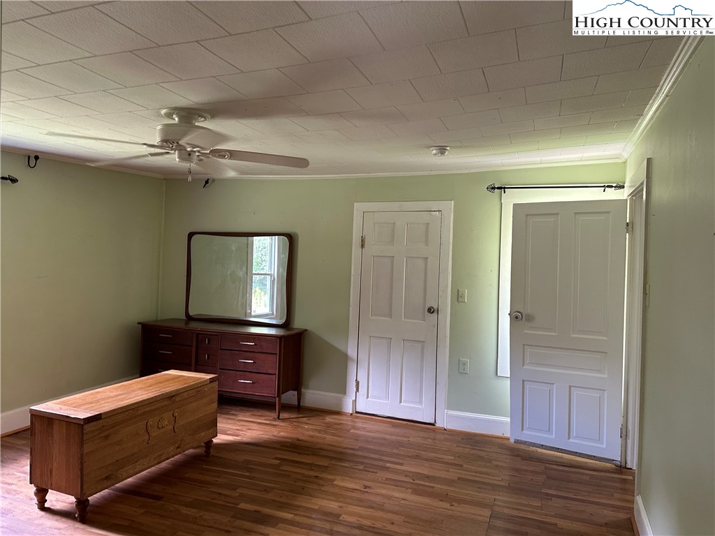 405 Wilson Road Ennice, NC 28623 - Photo 12 of 29 a living room with furniture and a ceiling fan