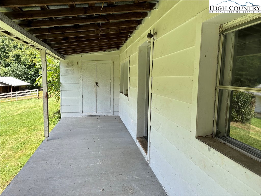405 Wilson Road Ennice, NC 28623 - Photo 18 of 29 a view of a porch