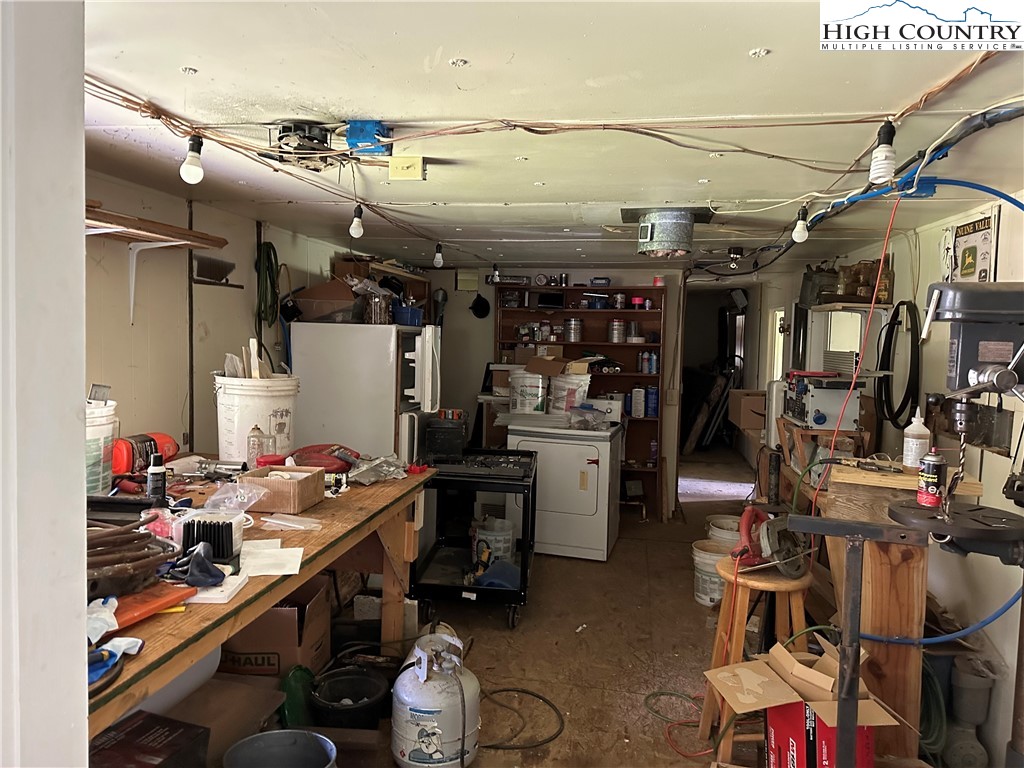 405 Wilson Road Ennice, NC 28623 - Photo 20 of 29 a room with lots of appliances and cabinets