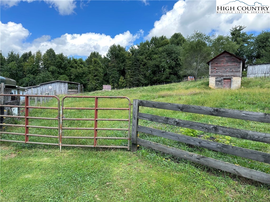 405 Wilson Road Ennice, NC 28623 - Photo 2 of 29 a view of a wooden fence