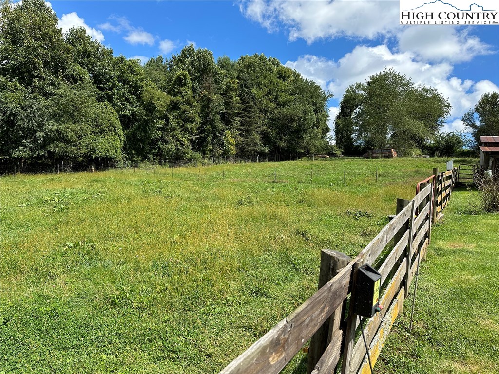 405 Wilson Road Ennice, NC 28623 - Photo 22 of 29 a view of an outdoor space and a yard