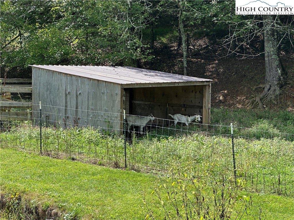 405 Wilson Road Ennice, NC 28623 - Photo 27 of 29 a view of backyard with green space