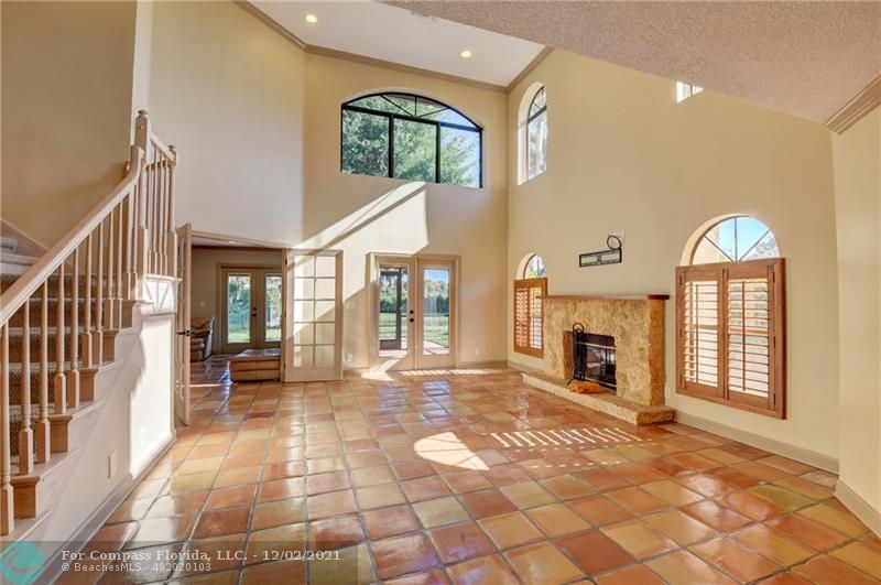 Mission Bay Boca Raton, FL 33428 - Photo 12 of 33 a view of an entryway with a fireplace