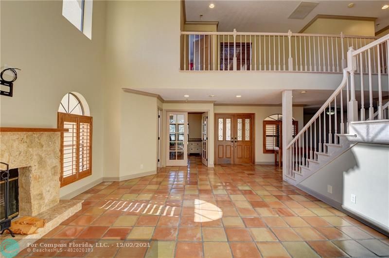 Mission Bay Boca Raton, FL 33428 - Photo 14 of 33 a view of a hallway with windows and stairs