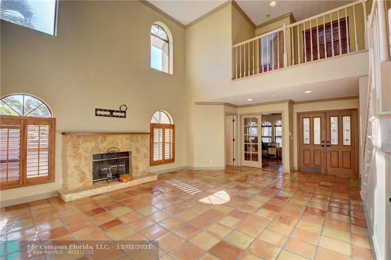 Mission Bay Boca Raton, FL 33428 - Photo 15 of 33 a view of livingroom with a fireplace and windows