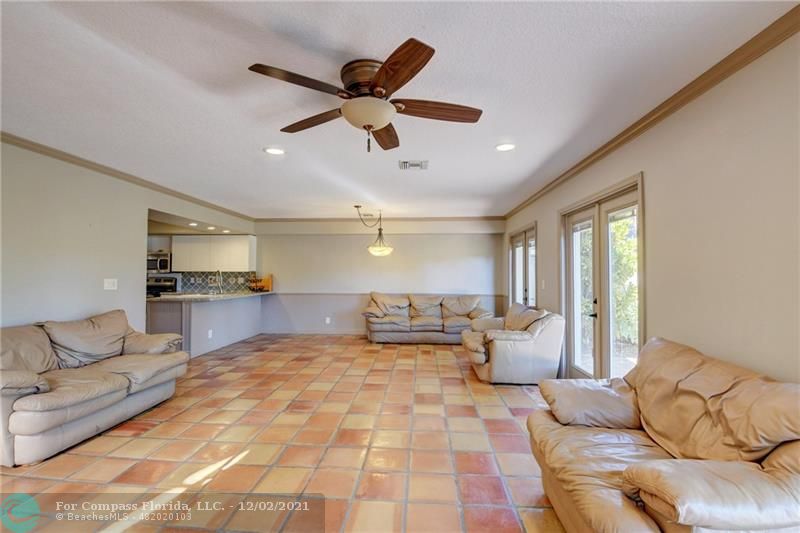 Mission Bay Boca Raton, FL 33428 - Photo 16 of 33 a living room with furniture and a large window
