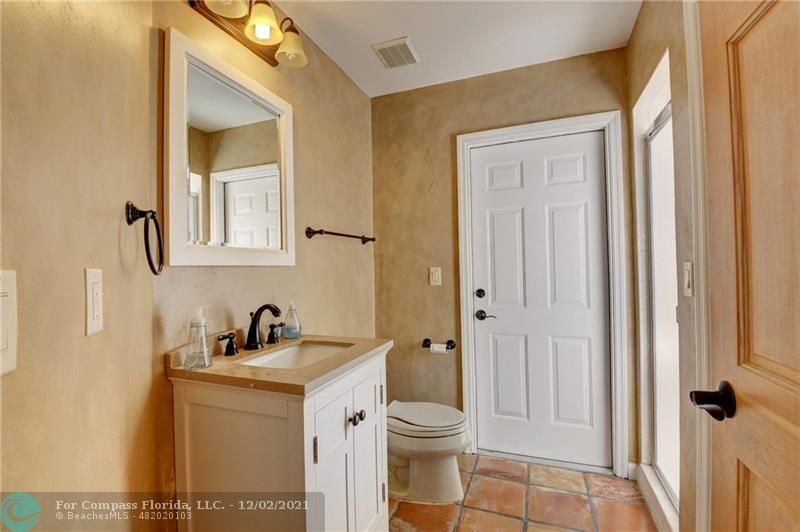 Mission Bay Boca Raton, FL 33428 - Photo 22 of 33 a bathroom with a sink toilet and shower