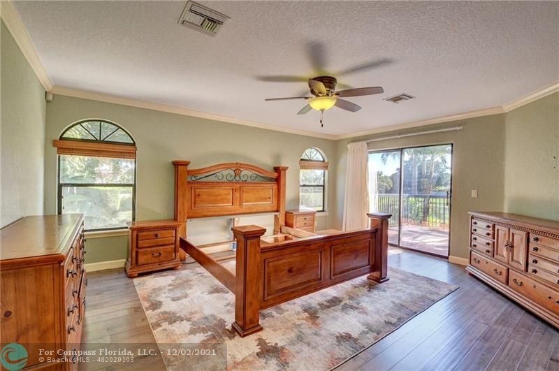 Mission Bay Boca Raton, FL 33428 - Photo 28 of 33 a living room with furniture and a window