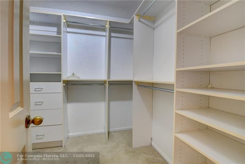 Mission Bay Boca Raton, FL 33428 - Photo 33 of 33 a view of walk in closet with empty racks