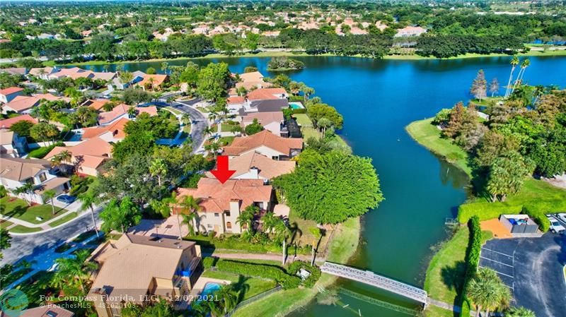 Mission Bay Boca Raton, FL 33428 - Photo 5 of 33 an aerial view of a house with a lake view