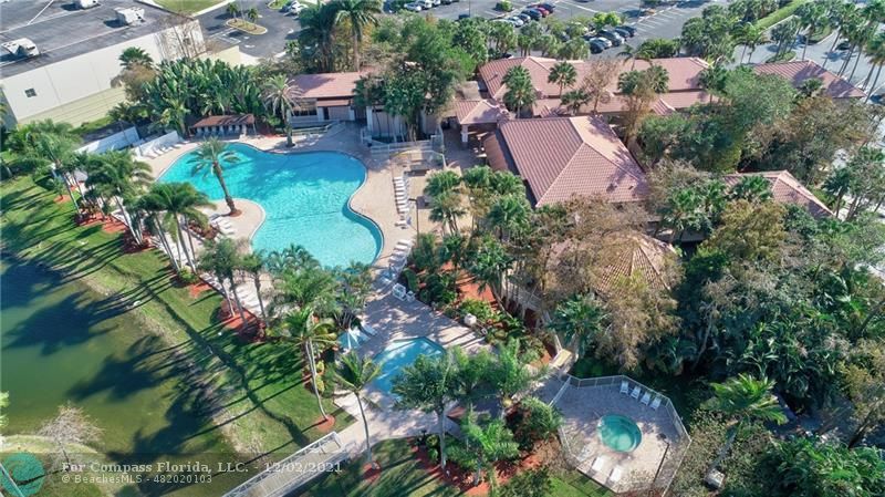 Mission Bay Boca Raton, FL 33428 - Photo 10 of 33 an aerial view of a house with a yard and lake view