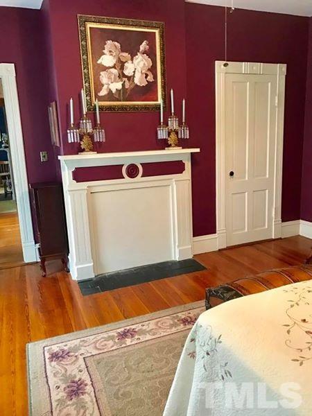 2685 Ridgeville Road Prospect Hill, NC 27314 - Photo 13 of 25 a bedroom with a bed and a flat screen tv