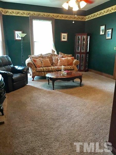 2685 Ridgeville Road Prospect Hill, NC 27314 - Photo 16 of 25 a living room with furniture rug and window