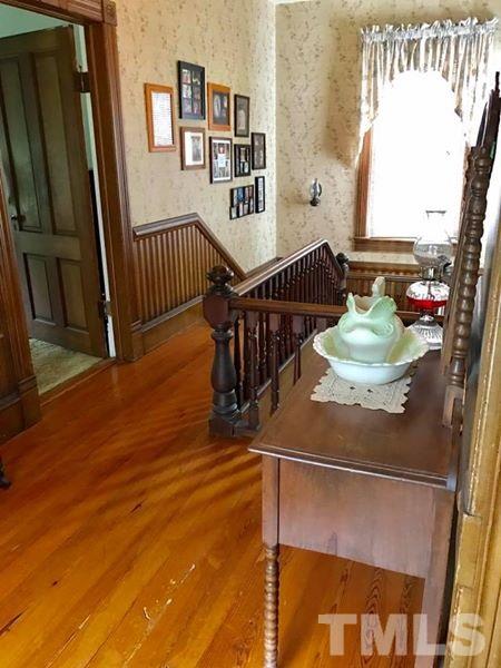 2685 Ridgeville Road Prospect Hill, NC 27314 - Photo 21 of 25 a dining room with wooden floor table and chairs