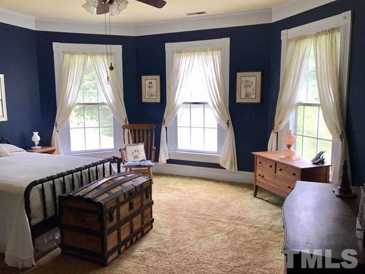 2685 Ridgeville Road Prospect Hill, NC 27314 - Photo 10 of 25 a bed room with furniture and a window