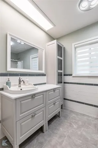 a bathroom with a sink and a bathtub