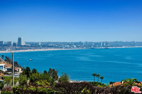 a view of a lake with a city