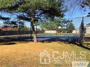 1226 Edpas Road New Brunswick, NJ 08901 - Photo 18 of 18 a view of a yard with wooden fence