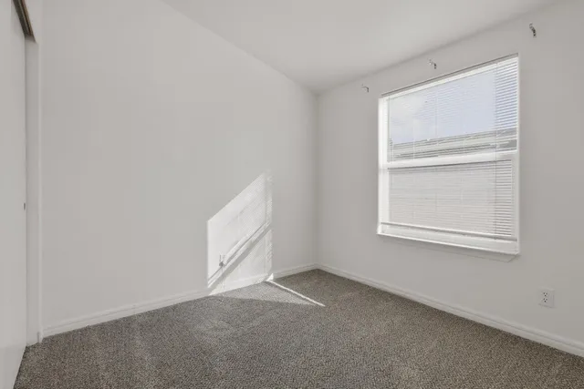 an empty room with windows