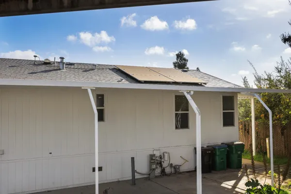 a view of a house with a terrace