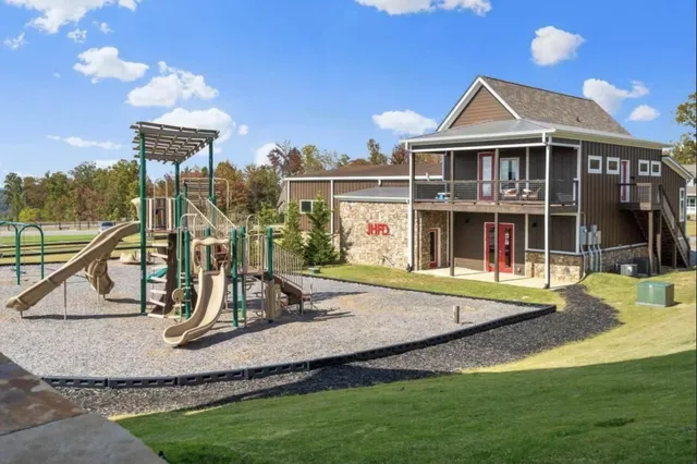 a view of a wooden bench in a yard