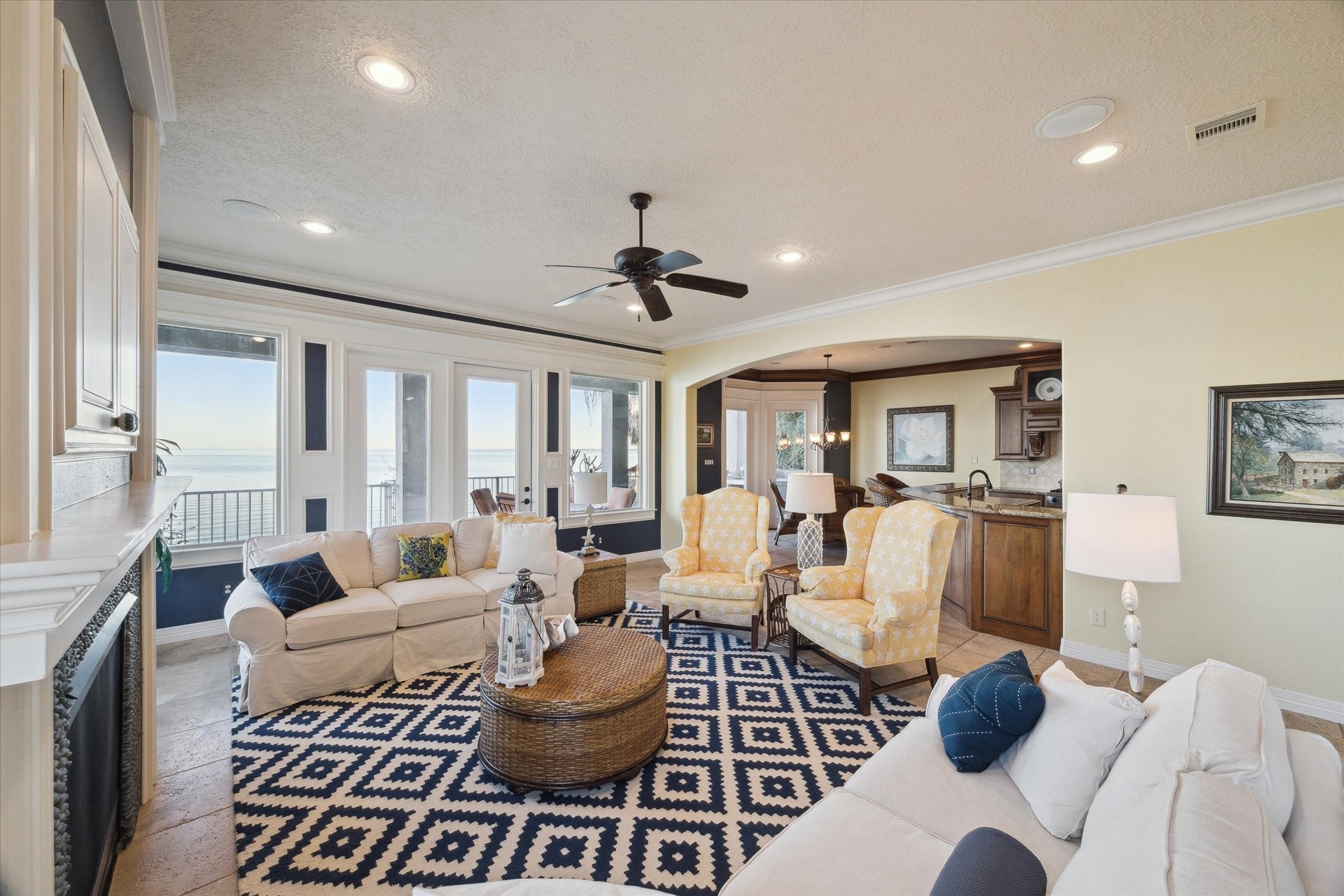 1406 Todville Road Seabrook, TX 77586 - Photo 15 of 50 SPACIOUS DEN OVERLOOKING THE BALCONY AND KITCHEN PROVIDING A GREAT ENTERTAINING SPACE.