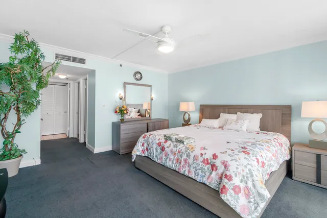 a living room with furniture a rug and a window