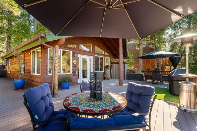 a outdoor space with patio the couches and a umbrella