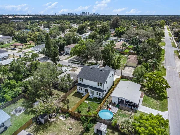 an aerial view of a house with a garden