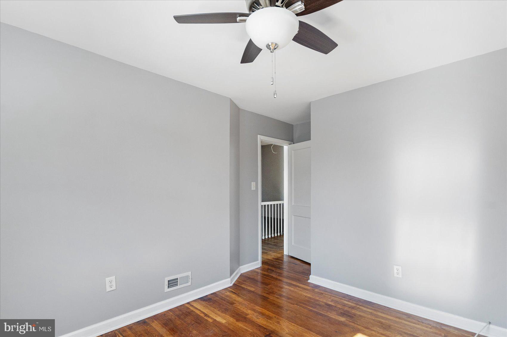 11 Cardinal Road Baltimore, MD 21221 - Photo 24 of 37 a view of an empty room and wooden floor