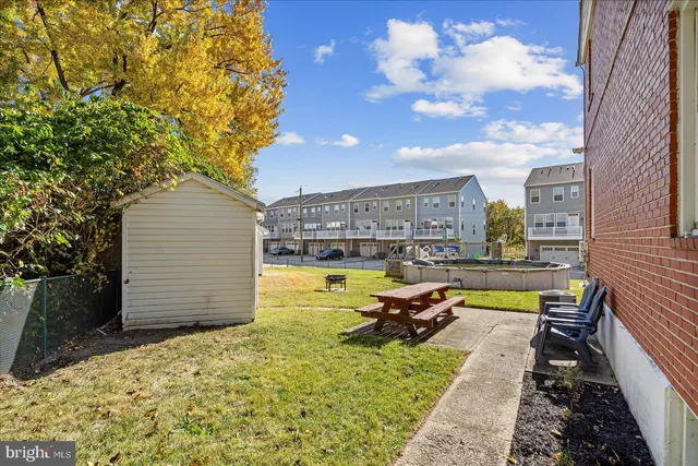 a view of a swimming pool with a lounge chairs
