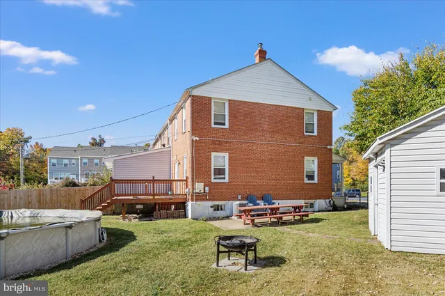 a backyard of a house with seating space
