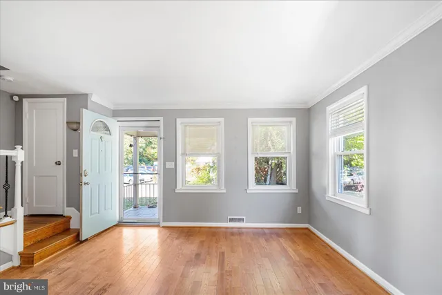 an empty room with windows