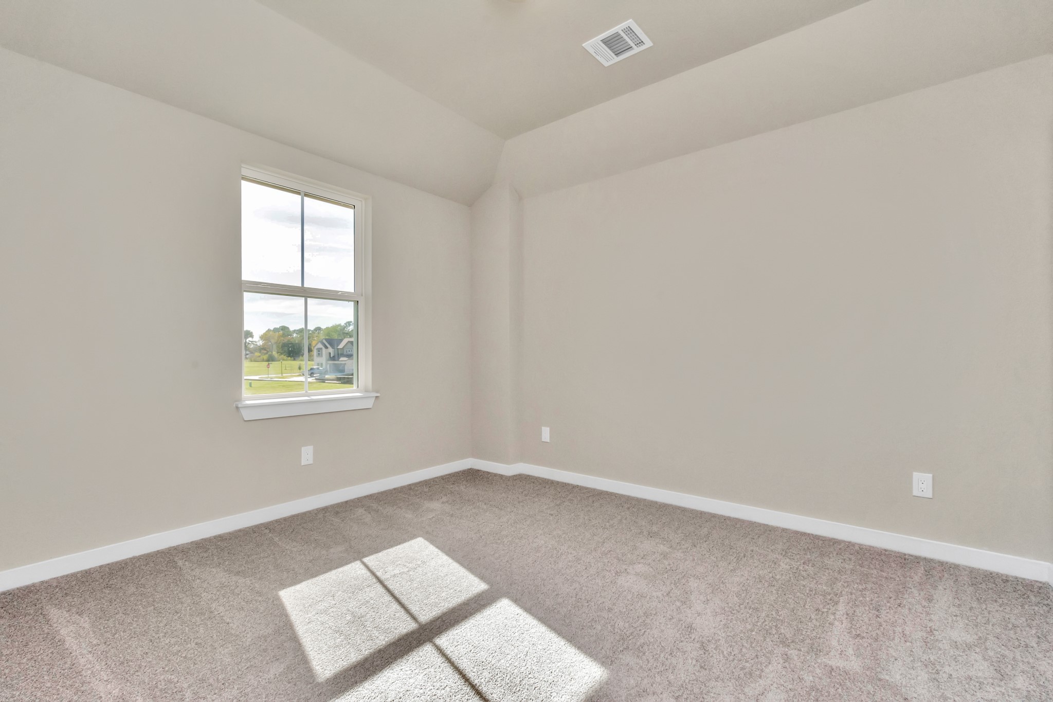 15119 Statice Trail Houston, TX 77044 - Photo 25 of 26 an empty room with a window