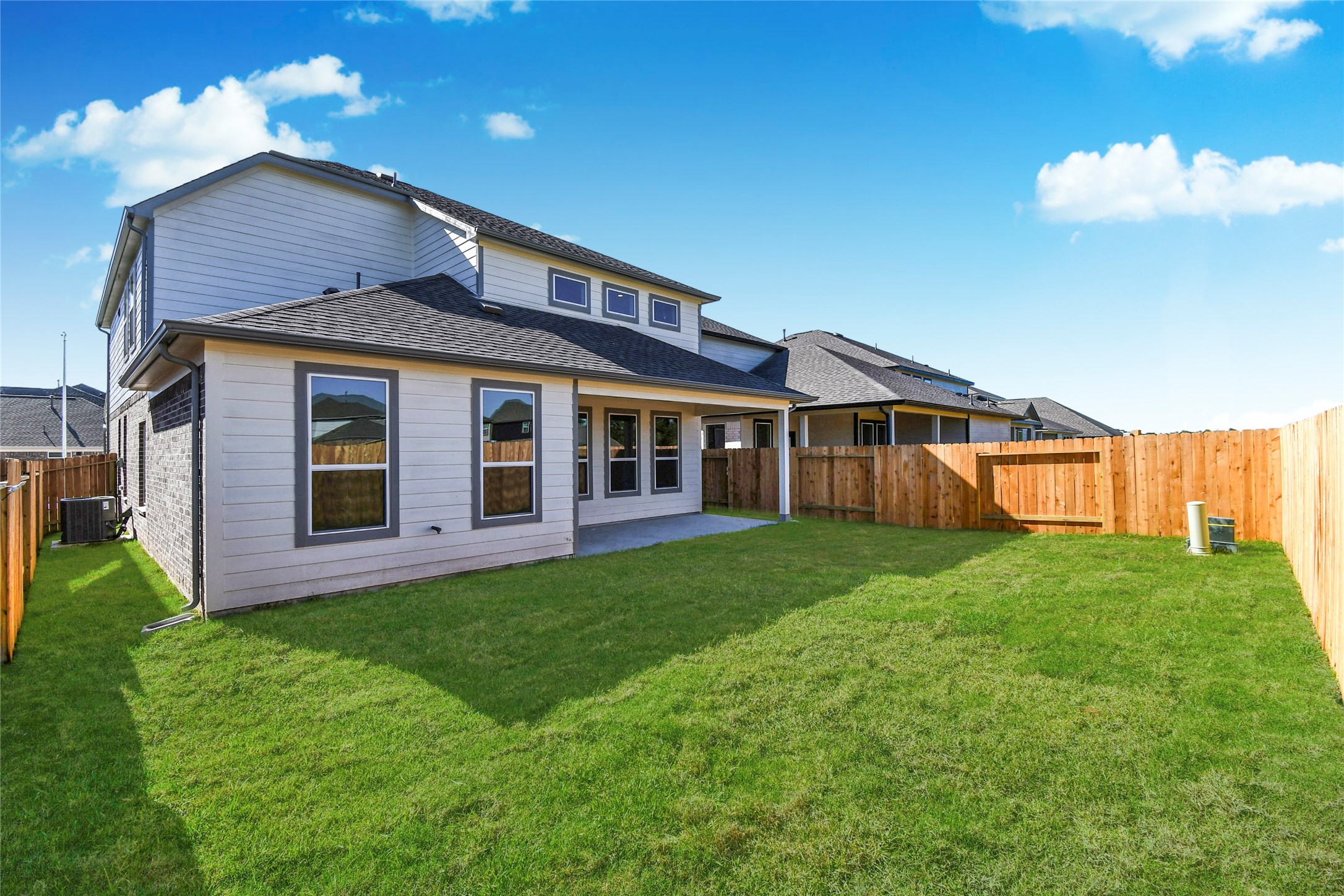 15119 Statice Trail Houston, TX 77044 - Photo 4 of 26 a view of a house with a yard