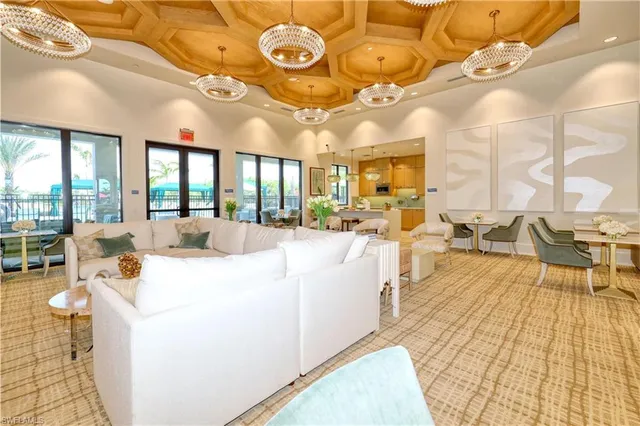 a living room with granite countertop furniture and a large window