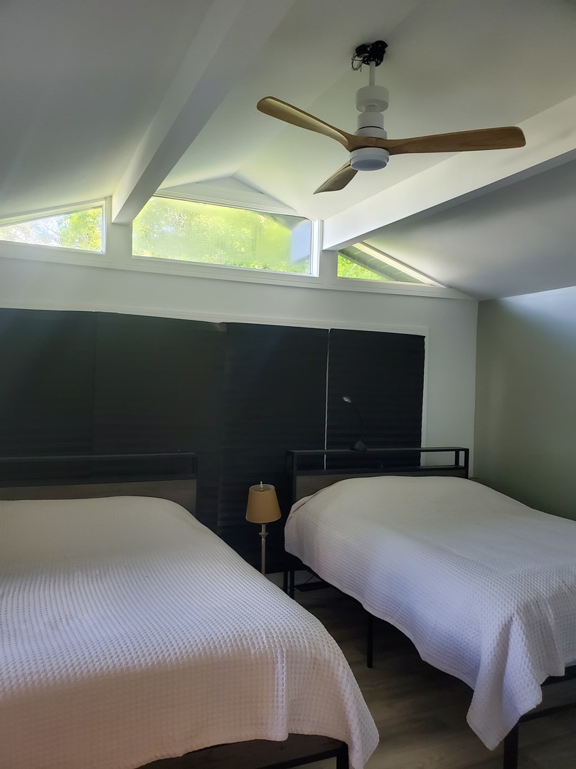 4-a94 Springfield Drive Apple River, IL 61001 - Photo 25 of 35 a bedroom with two beds and a ceiling fan