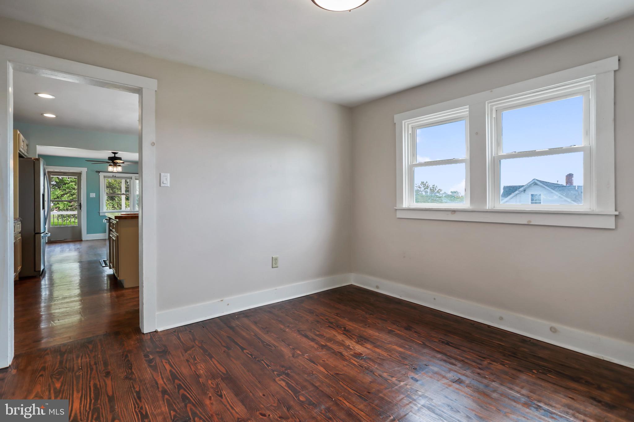 217 Poorhouse Road Winchester, VA 22603 - Photo 25 of 39 wooden floor in an empty room with a window