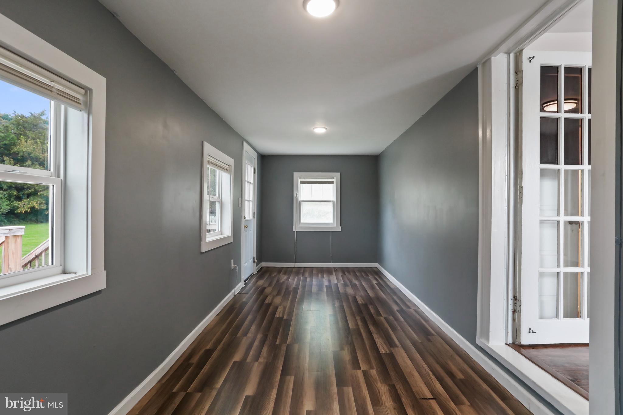 217 Poorhouse Road Winchester, VA 22603 - Photo 27 of 39 a view of wooden floor in an empty room