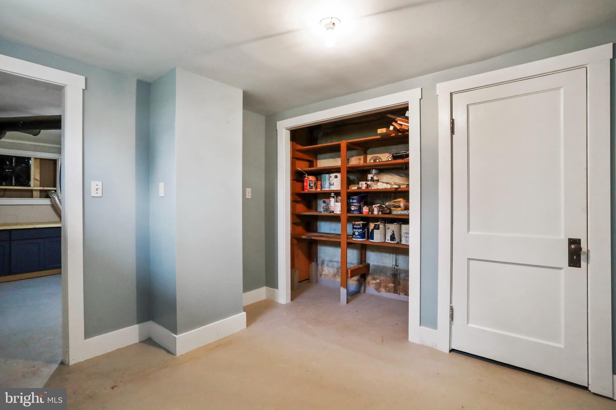 217 Poorhouse Road Winchester, VA 22603 - Photo 30 of 39 a view of a room with shelves