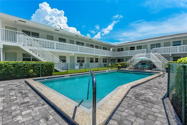a view of a house with a swimming pool