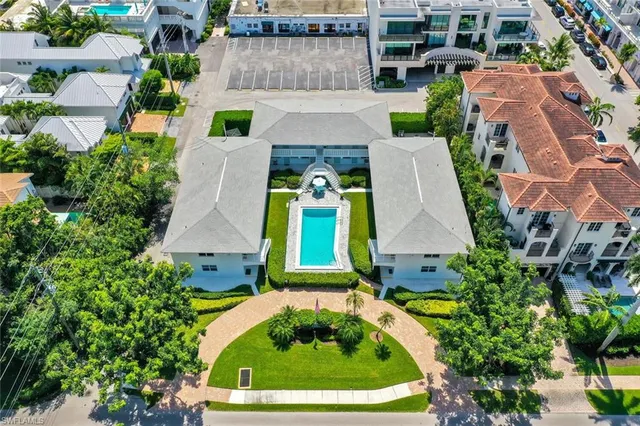 an aerial view of a house with a garden