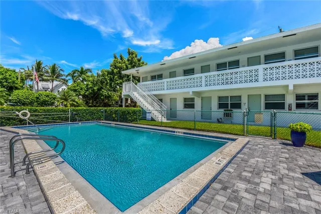 a view of a house with swimming pool