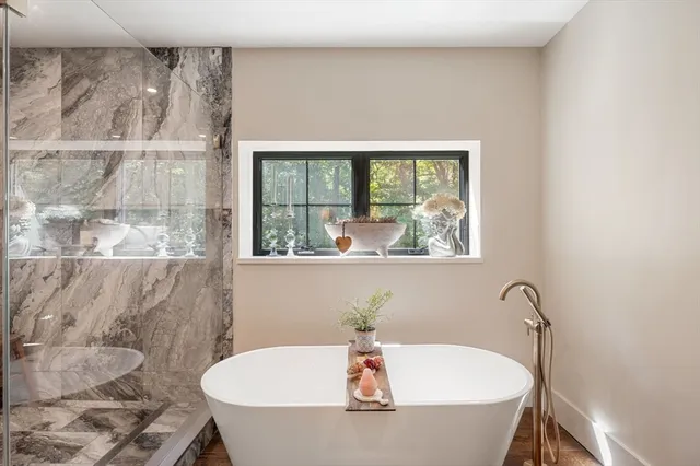 a view of a hallway with seating area