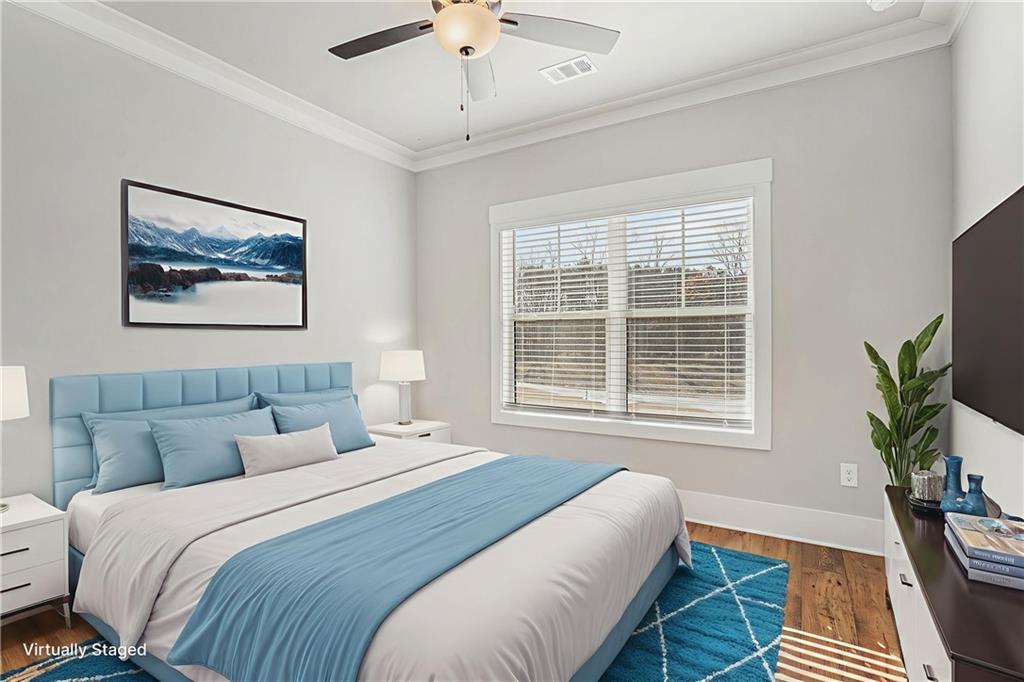 1119 Heights View Way Monroe, GA 30655 - Photo 14 of 30 a bedroom with a large bed and a window