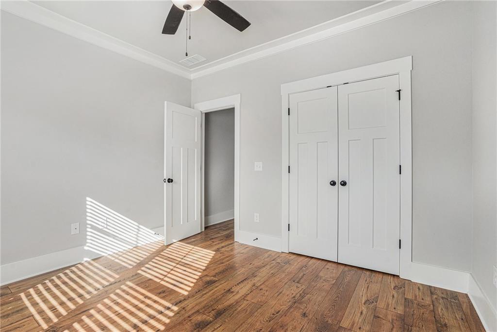 1119 Heights View Way Monroe, GA 30655 - Photo 15 of 30 a view of a bedroom with wooden floor