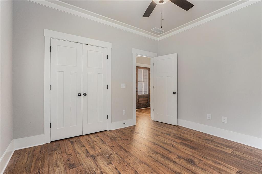 1119 Heights View Way Monroe, GA 30655 - Photo 18 of 30 wooden floor in an empty room