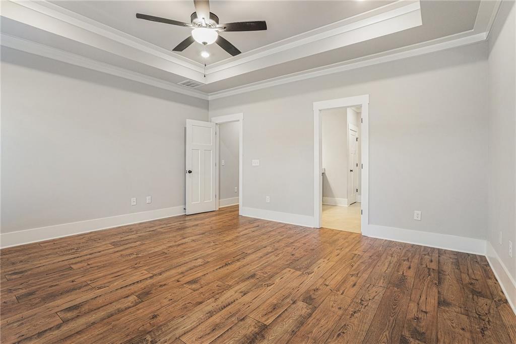 1119 Heights View Way Monroe, GA 30655 - Photo 24 of 30 a view of an empty room and wooden floor