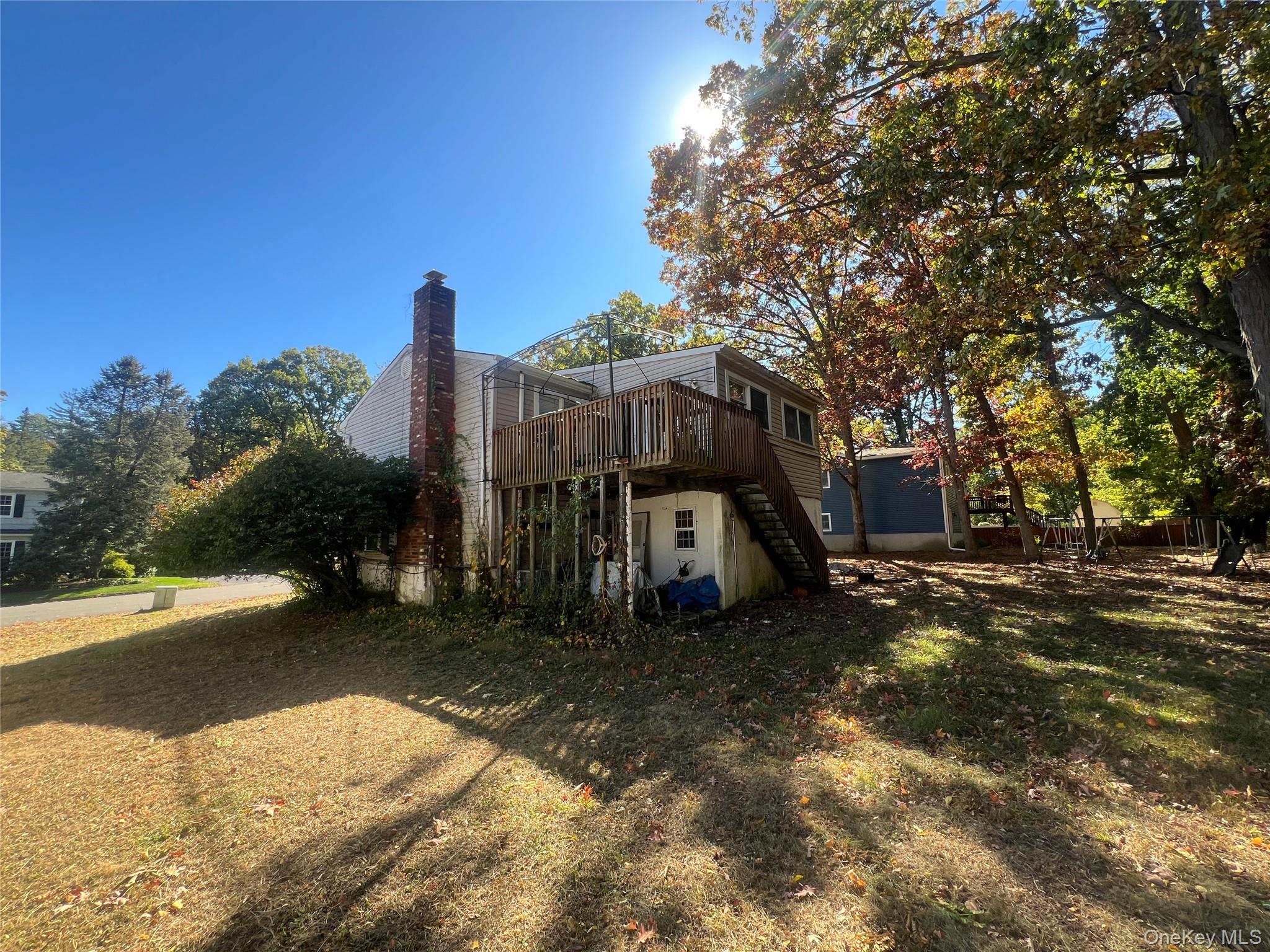 41 Roe Avenue Cornwall, NY 12518 - Photo 3 of 4 a view of a house with backyard and trees