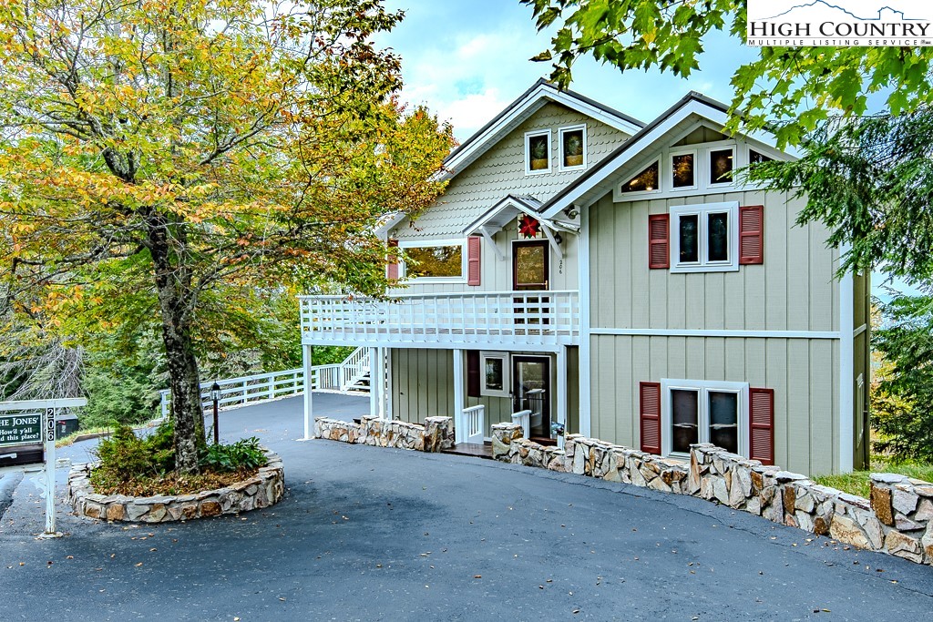 206 Pinnacle Ridge Road Beech Mountain, NC 28604 - Photo 41 of 41 a front view of a house with a yard